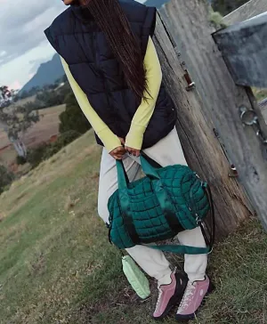 In A Bubble Puffer Vest In Black
