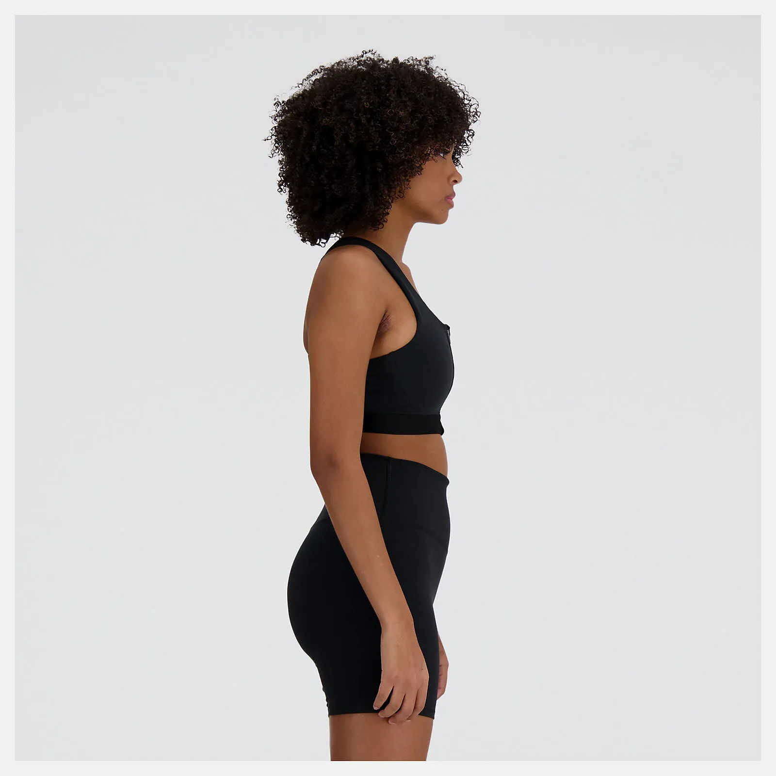 New Balance Sleek Medium Support Pocket Zip Front Bra - Black - WOMEN (WB41047) New Balance