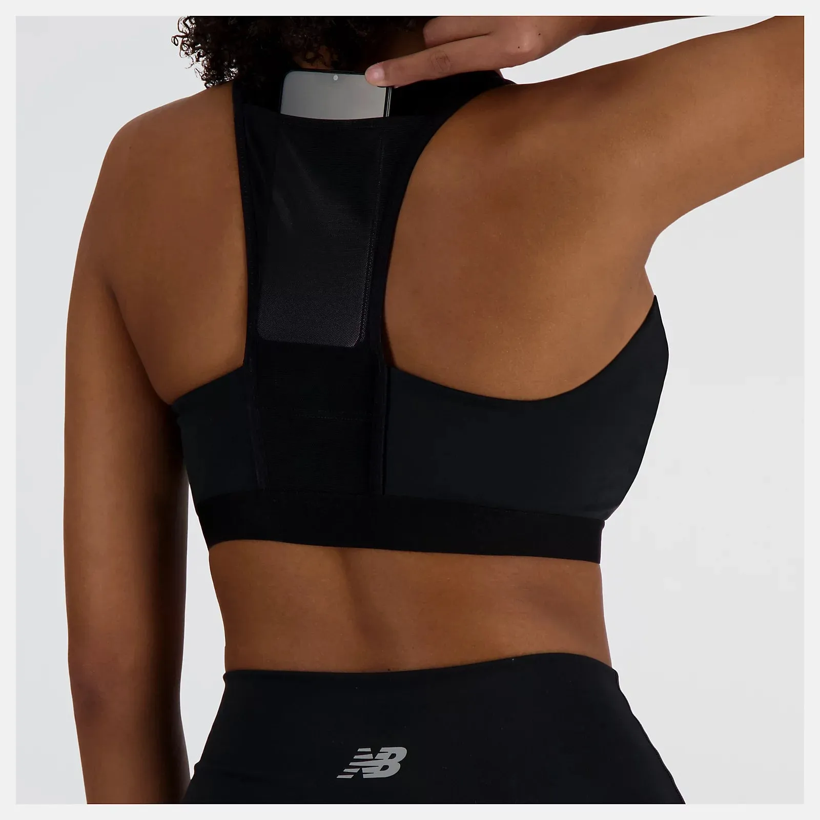 New Balance Sleek Medium Support Pocket Zip Front Bra - Black - WOMEN (WB41047) New Balance